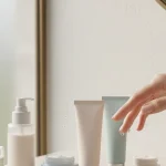 Skincare layering routine: A photorealistic image of various products in a beautiful arrangement.